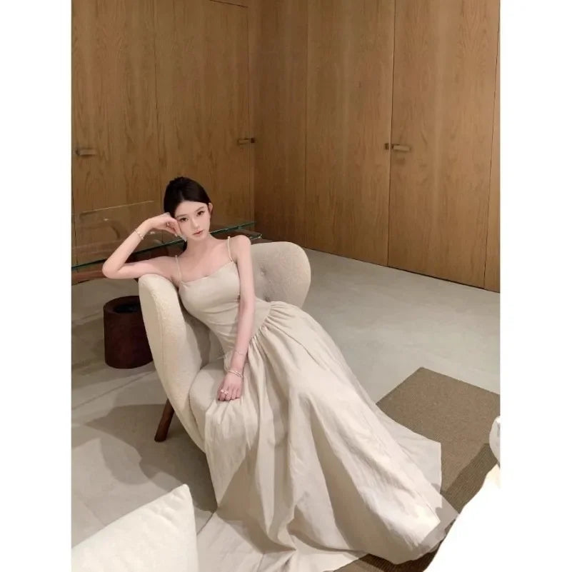 Temperament Apricot Suspender Dress Gentle Vacation Style Waist Cinched Backless Big Swing A-line Long Skirt Q147