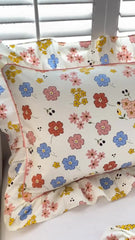 A pair of cotton printed pillowcases with ruffled edges, garden body pillowcases, bed pillowcases