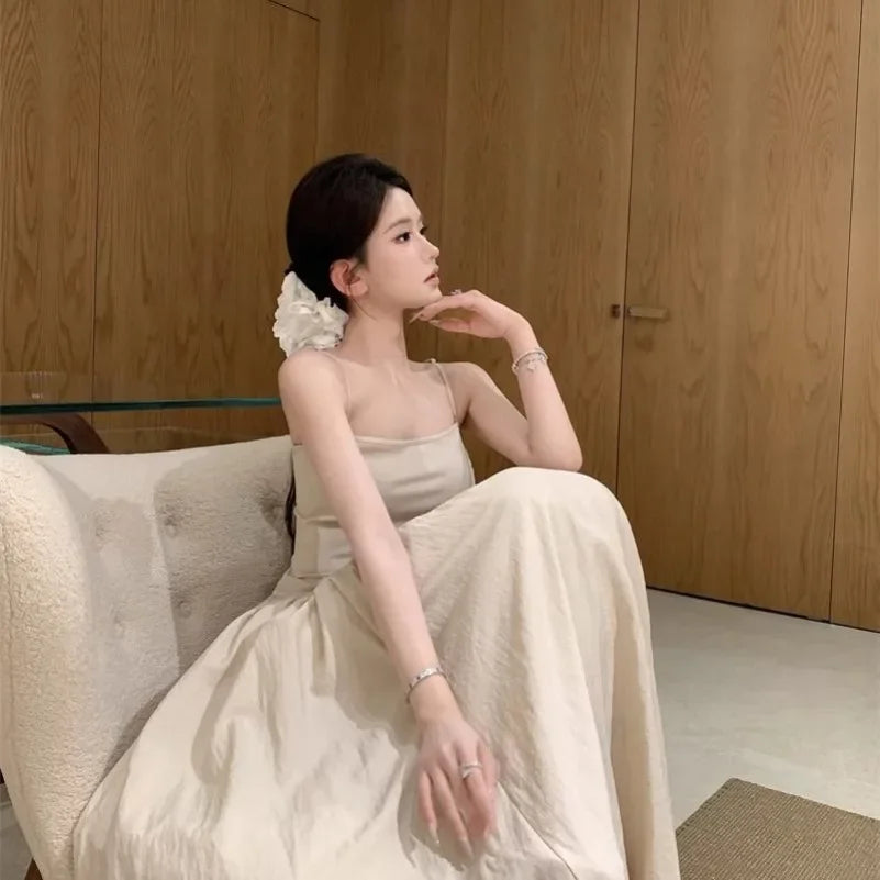 Temperament Apricot Suspender Dress Gentle Vacation Style Waist Cinched Backless Big Swing A-line Long Skirt Q147
